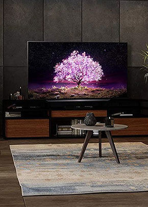 Image of TV showing bright pink tree